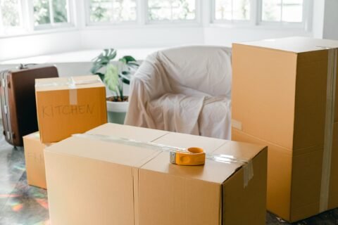 empty-apartment-with-packed-carton-boxes-before-moving-4246119